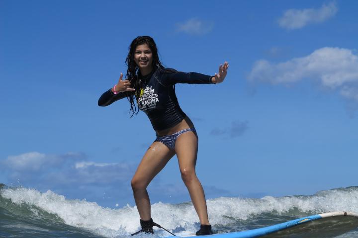 Antonella Barba standing next to a body of water